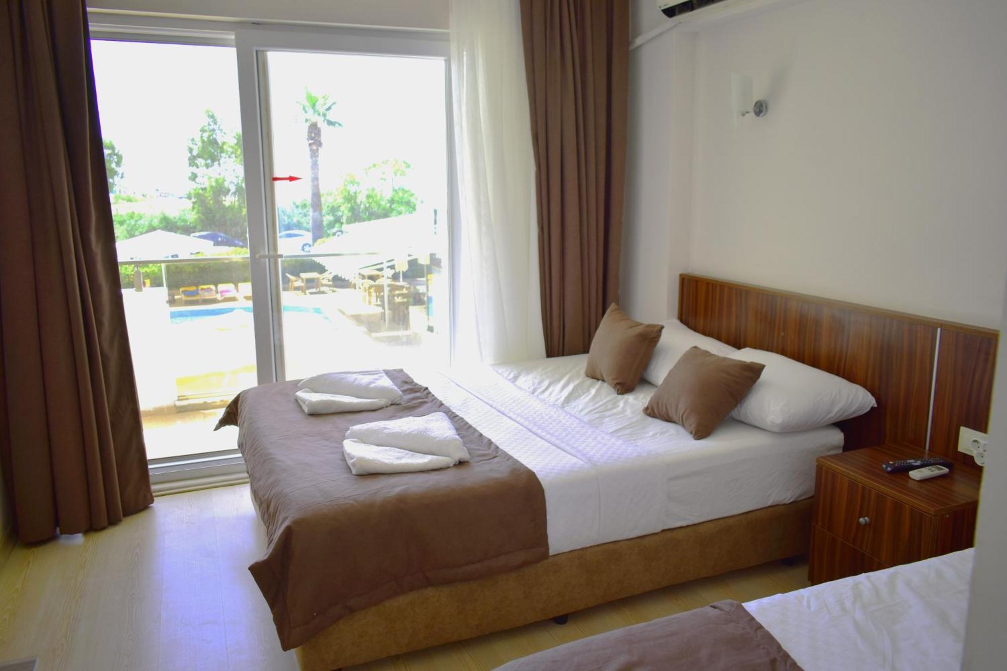Mulka Hotel Айвалык Экстерьер фото
